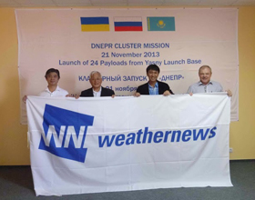 Satellite project staff in Russia with Weathernews RMD Captain Jiro Miyabe (center left) after the successful launch of WNISAT-1