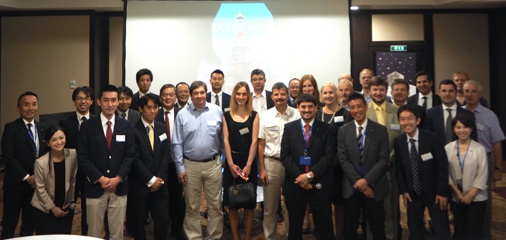 Participants at the opening ceremony proudly pose for a group photo